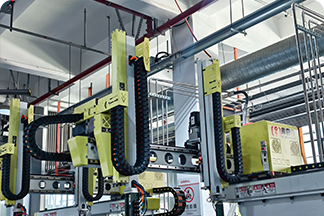 Each injection molding machineis equipped with A5-axis robot